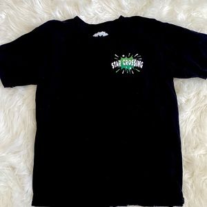 Unisex t-shirt has good quality. The brand is by a small business star crossing.